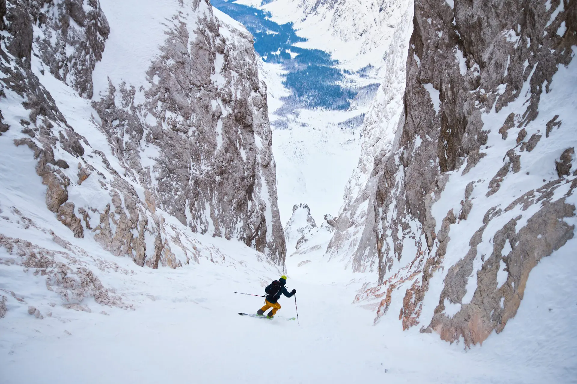 Skier descending the slopes of Mt. Jalovec in the Julian Alps, Slovenia