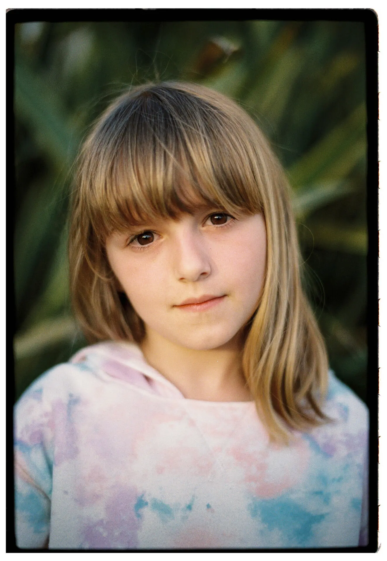Portrait of my niece Natali with 50mm Summilux and Kodak Gold 200.